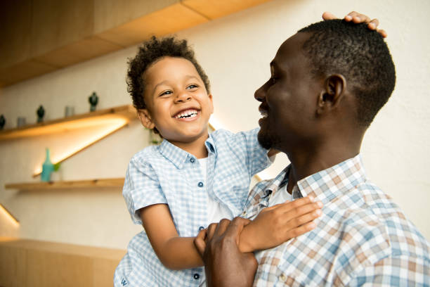 istock african american father and child hugging 861356256