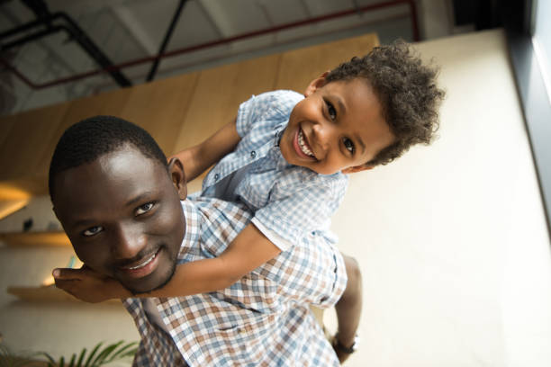 istock african american father and child hugging 861356646