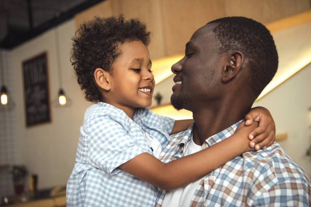 istock african american father and child hugging 861357522