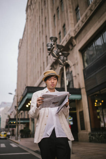 istock Reading the news on the way home 861364148