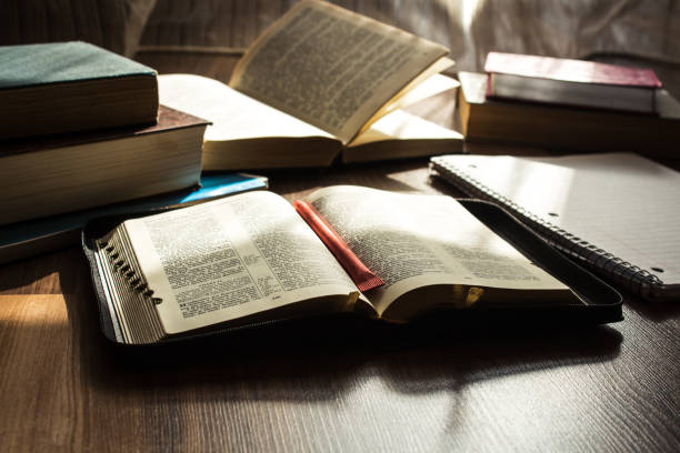 istock morning bible reading on wooden floor 861364818