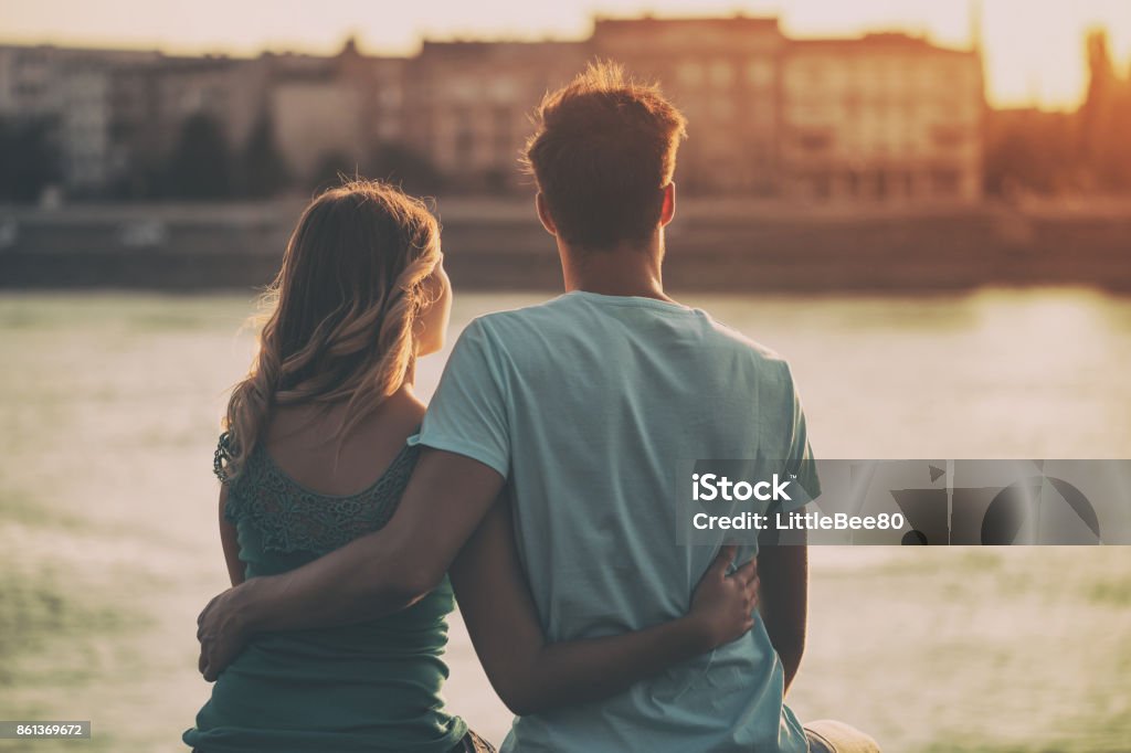 Happy couple Happy couple enjoy spending time together.Image is intentionally toned. Couple - Relationship Stock Photo