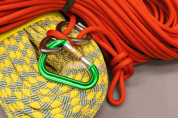 istock Red and yellow dynamic ropes and attached carabiner 861383968