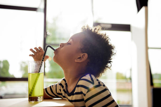 istock african american child drinking lemonade 861383998