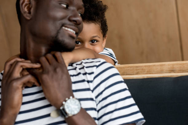 istock african american father and child hugging 861386486