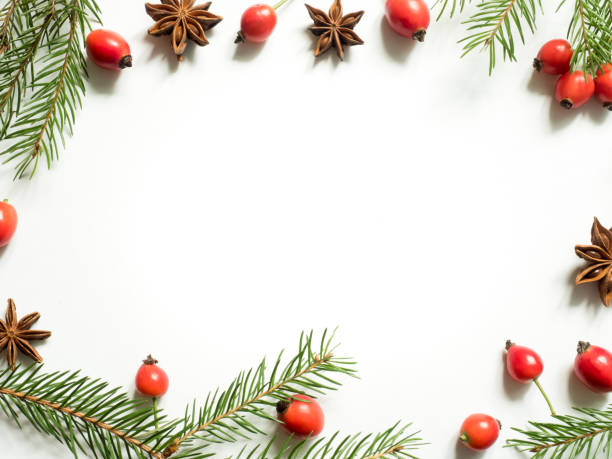 istock Christmas decorations on a white background, berries rose hips, stars, fir branches. copy space 861388396