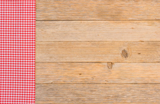 istock Red table-cloth, top view, on wooden background 861399096