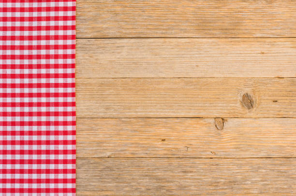 istock Red table-cloth, top view, on wooden background 861399402