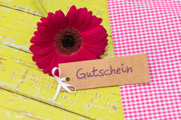 istock Beautiful daisy gerbera flower gift with voucher tag 861408006