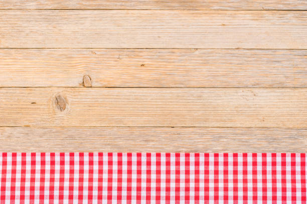 istock Red table-cloth, top view, on wooden background 861408348