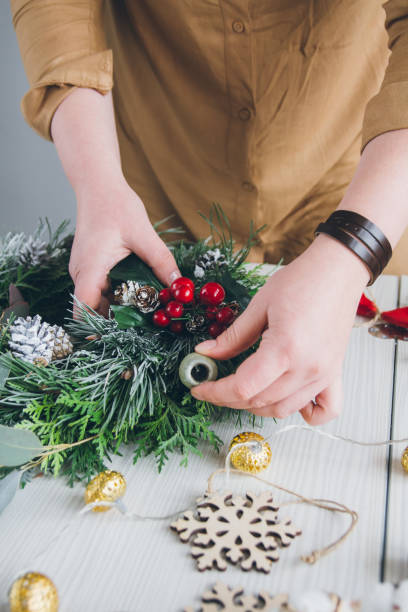 istock Florist decorator making Christmas wreath 861416114
