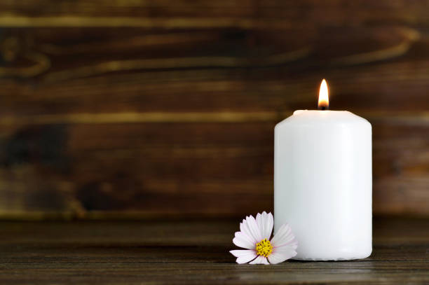 istock Memorial candle and flower 861416204