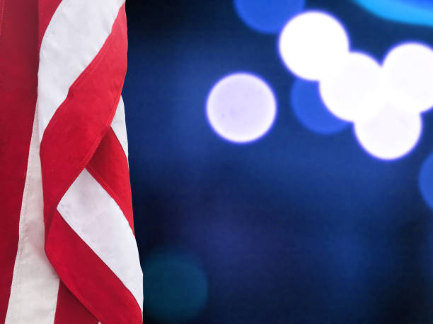 istock Patriotic American Flag and Blue Lights Background 861418714