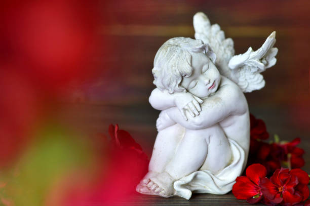 istock Little guardian angel sleeping 861418842