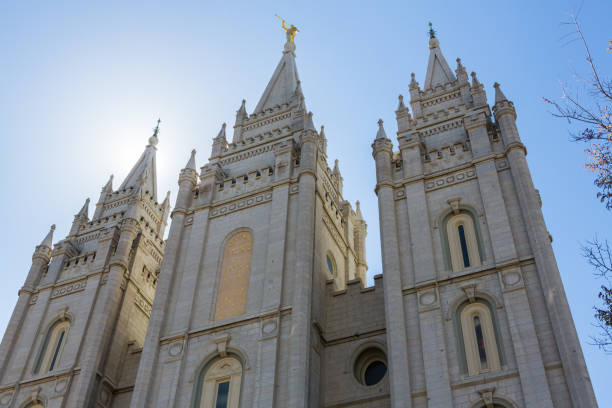 Salt Lake City LDS Temple Spires Salt Lake City LDS Mormon Temple spires with sun lighting it from behind mormonism stock pictures, royalty-free photos & images