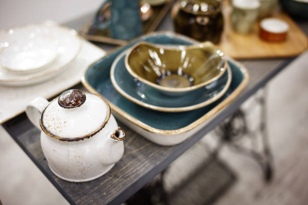 istock vintage white teapot and utensils on a wooden table 861427436
