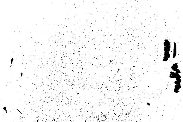 istock Grainy grunge abstract texture on a white background. Paint spray, drop. Black ink blow explosion on white background. Splatter of calligraphy ink in black on white background. Vector. 861456020