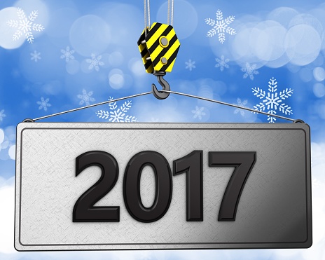 3d illustration of 2017 sign with crane hook over snow background