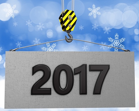 3d illustration of 2017 sign with crane hook over snow background