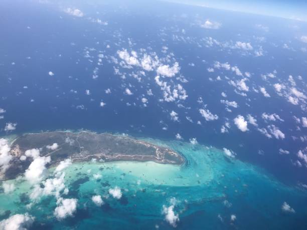 istock Flying over Caribbean island and sea 861467622