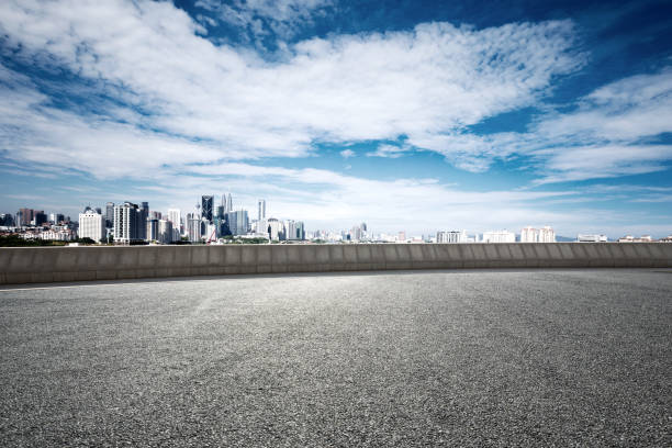 istock empty asphalt road with cityscape of modern city 861471300