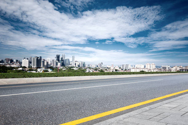 istock empty asphalt road with cityscape of modern city 861473814