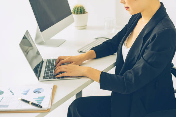 istock asian business woman working on laptop 861483828