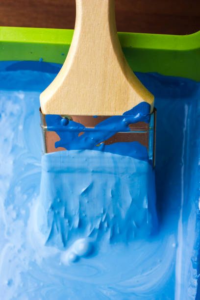 istock Brush in blue paint. 861490172