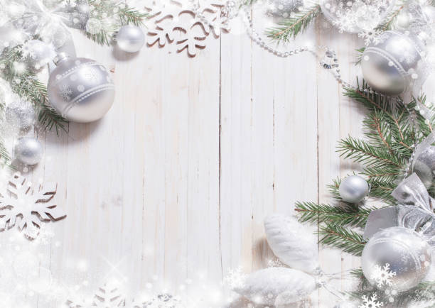 istock Silver Christmas decoration on wooden background 861505098