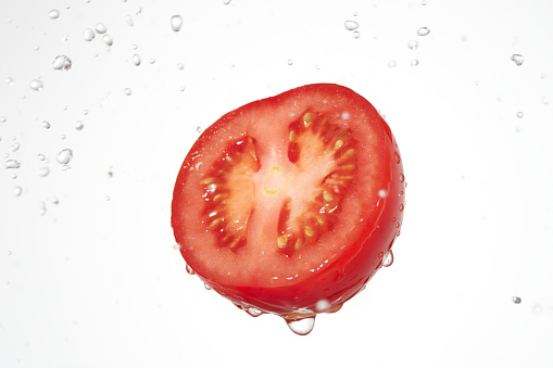 the tomato with water splash