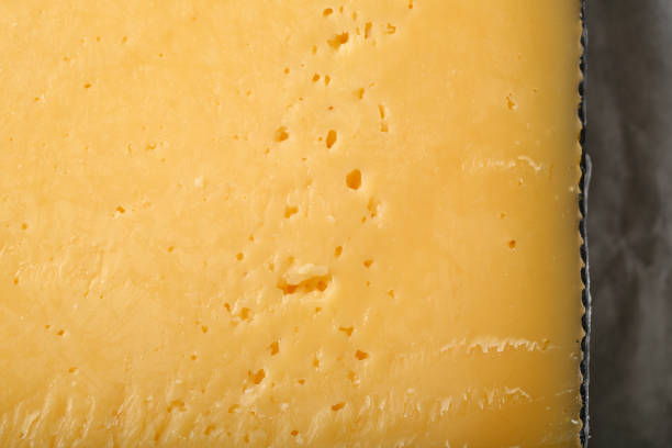 istock Yellow cheese closeup, food above 861511808