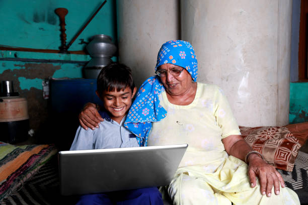 istock Grand mother and Son using Laptop at Home 861524900