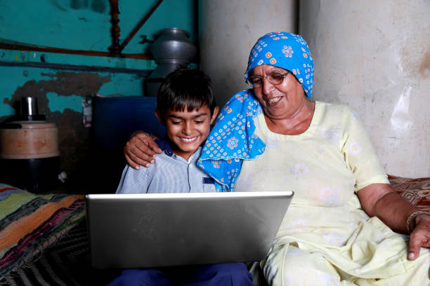 istock Grand mother and Son using Laptop at Home 861524904