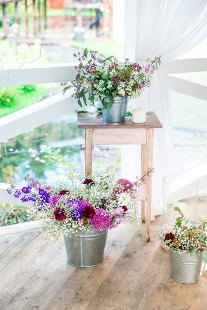 istock flowers with decor and white wood 861527588