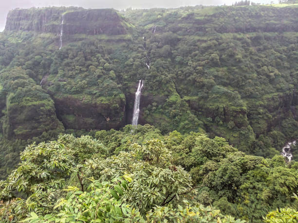 istock waterfall on a mountain in Himalaya. 861534254