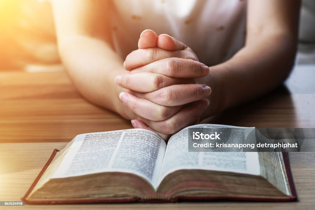 Women Reading holy Bible. Bible Stock Photo