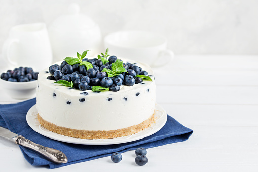delicious no baked cheesecake with fresh blueberry, selective focus,