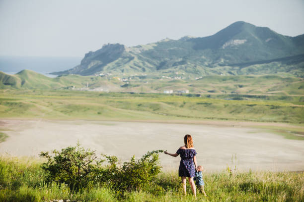 istock mother and son in mountains 861546848