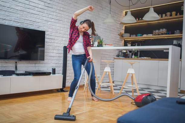 istock Happy woman cleaning house 861549444