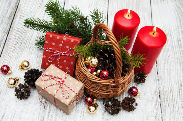 istock Christmas gift boxes and fir tree branch in basket 861549682