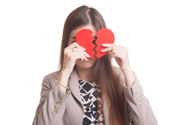 istock Beautiful young Asian woman with broken heart. 861550174