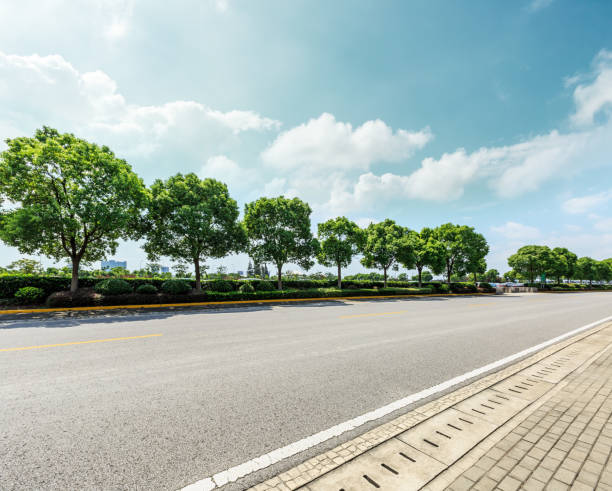 istock asphalt road and green forest under the blue sky 861553720
