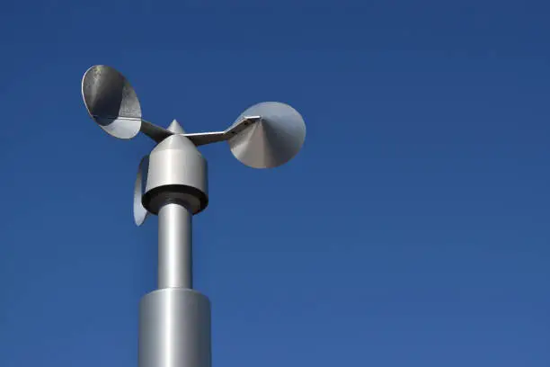 close up of aluminum anemometer on roof
