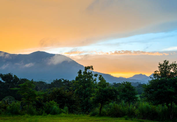 istock Colorful Sky and Clouds drifting over the forest mountain in evening time 861572252