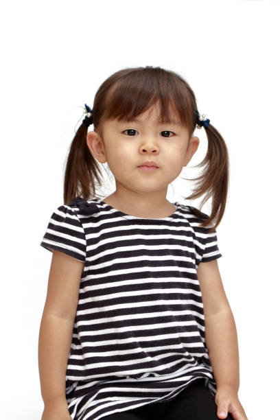 istock smiling Japanese girl (2 years old) (white back) 861572576