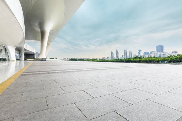 istock Empty square floor and modern city commercial building 861576422