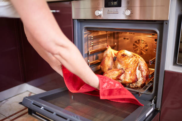 istock Baked roasted chicken in oven. Food concept. 861576570