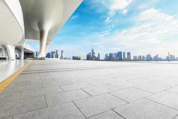 istock Empty square floor and modern city commercial building 861578824