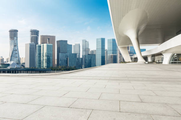 istock Empty square floor and modern city commercial building 861584842