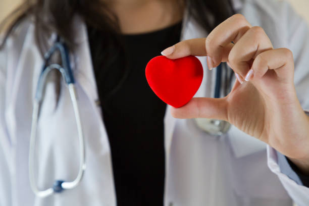 istock Doctor holding heart 861591240